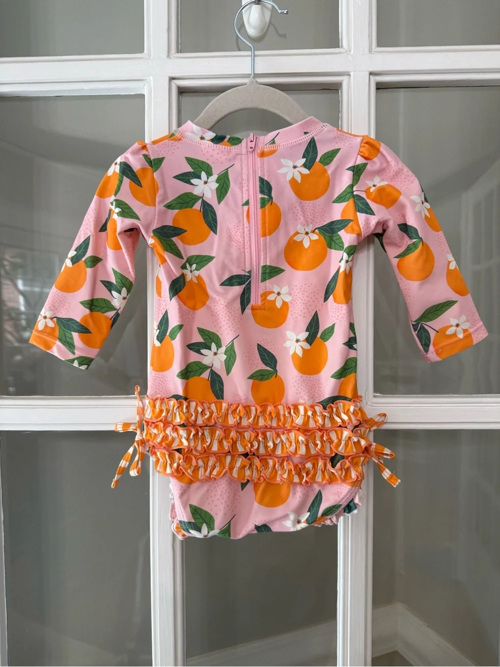 Ruffle Butts Pink Swimsuit with Orange Fruit Print